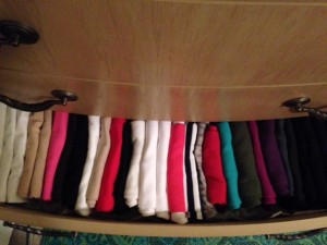 Here they are all nestled in the drawer. Even using Huggable Hangers, I save a lot of closet space by folding them.